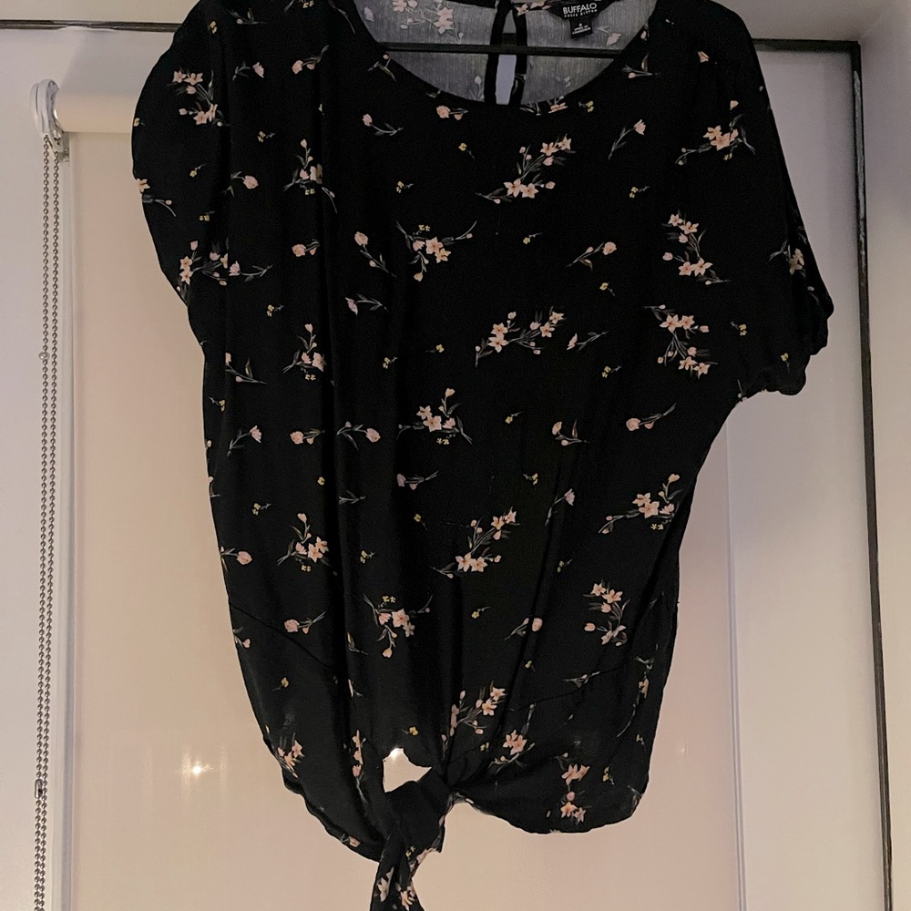 Women’s floral blouse with tie at bottom. Worn once